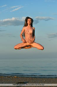 Naked Babe Looks Like She Is Floating In Air